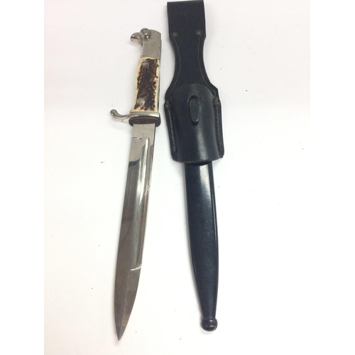 1735 - A German K98 Dress Bayonet By E.Pack With Horn Handles and Dress Frog. In Good Condition.