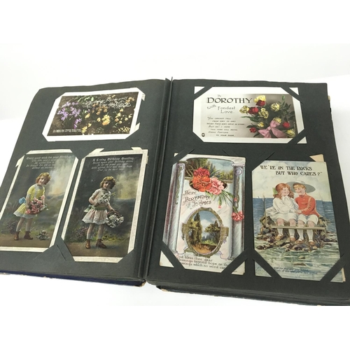 1758 - A postcard album containing various vintage postcards. Postage cateC