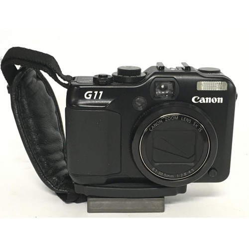 1931 - A Canon Powershot G11 camera, postage category B