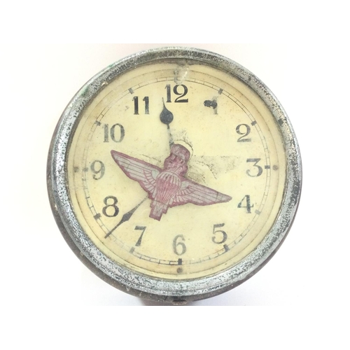 1937 - A vintage bakelite clock with a parachute regiment insignia, for spares or repairs.- NO RESERVE