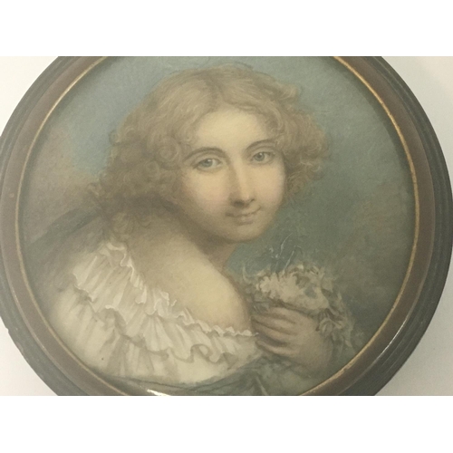 900 - A early 19th century circular tortoiseshell box 9.5 cm inset with a portrait of a maiden attributed ... 