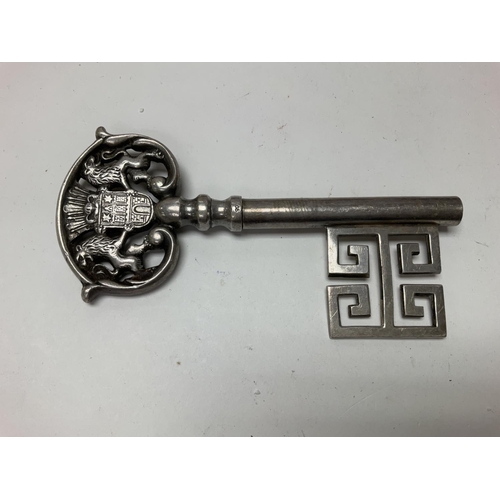 942 - A silver Continental key corkscrew.