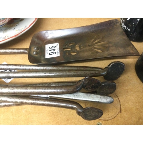 946 - A set of Arts & Crafts style fire irons. Shipping category D.