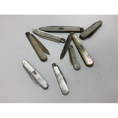 949 - Eight silver and mother of Pearl pen knives.