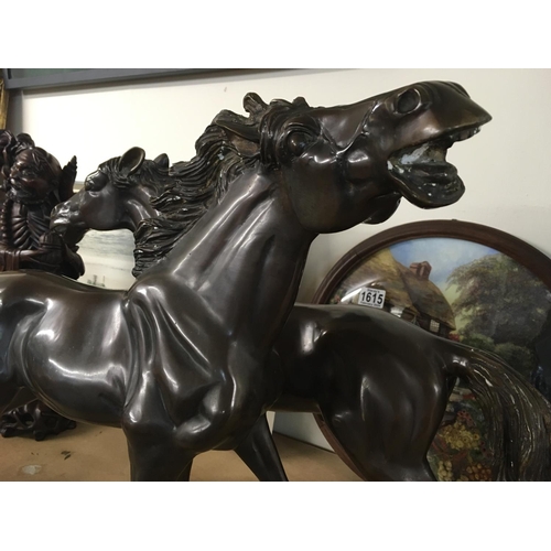 965 - A pair of bronzed galloping horses, 40 cm height 47 cm wide