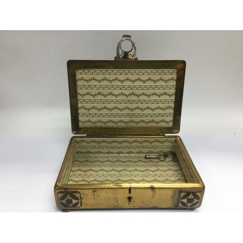 993 - A Secessionist style brass card box. The hinged lid decorated with knights in armour, approx 23cm x ... 