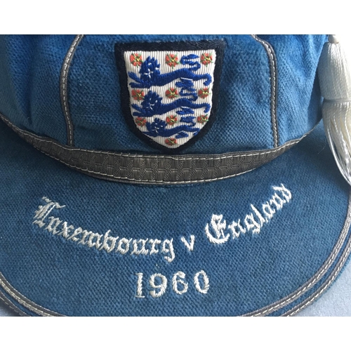 12 - Bobby Charlton England Football Cap: Excellent condition blue tasselled cap with 3 Lions above the p... 