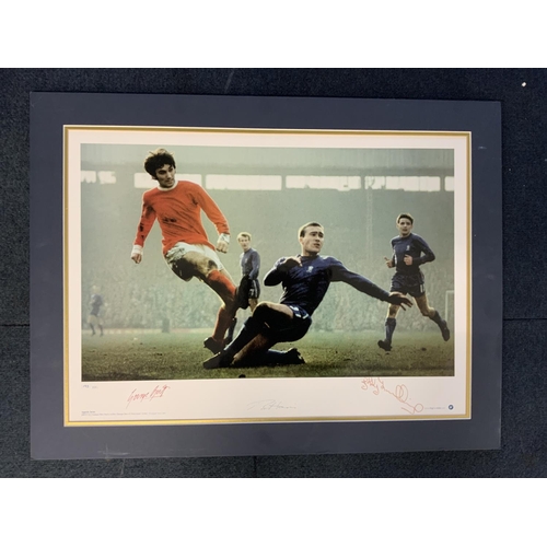 529 - George Best + Ron Harris Signed Football Print: Originally a print of a Manchester United v Chelsea ... 