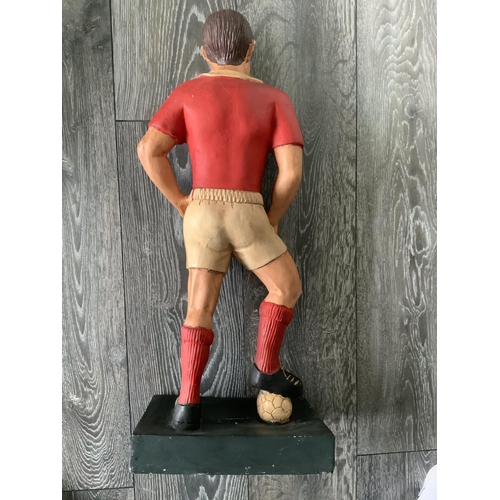 665 - Britains Toys Advertising England Football Figure: Footballer in red and white kit stood on black ba... 