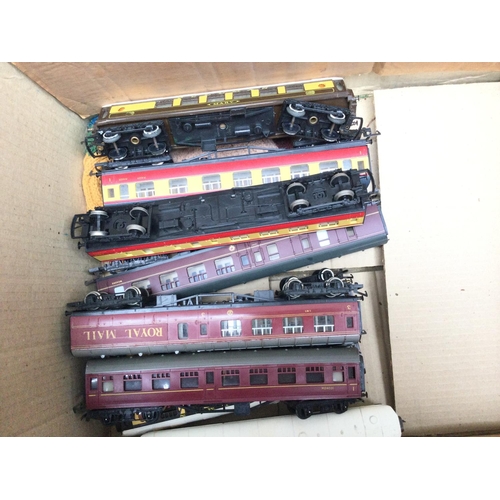 175 - A Box Containing A Collection of 00 Gauge Coaches and Rolling Stock.