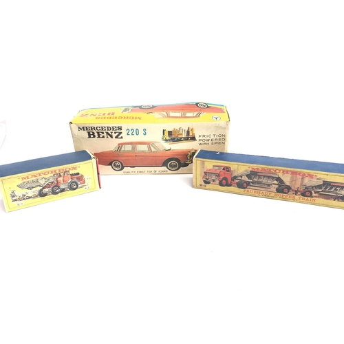 3 - A Boxed Matchbox Hatra Tractor #K-3. A Fruehauf Hopper Train #M-4 and a Boxed Japanese Mercedes Benz... 