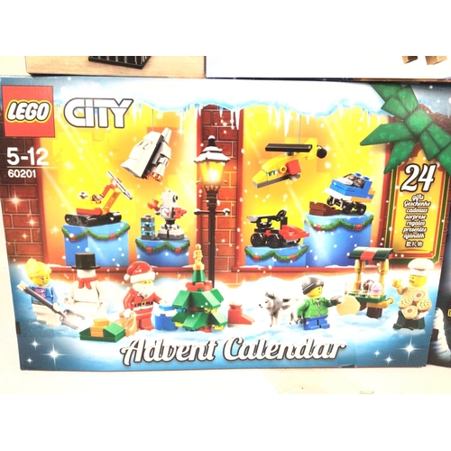 694 - 3 Boxed And Sealed Lego Advent Calendars. Lego City #6021. Star Wars #75056 and #75213. And a Nutcra... 