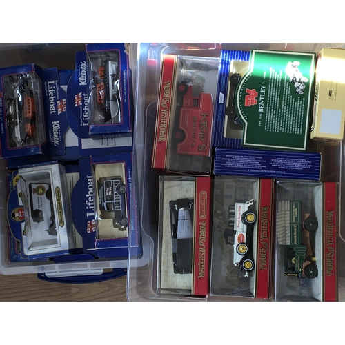 700 - Three boxes containing Matchbox models of Yesteryear Lledo and RNLI theme boats and vehicles.