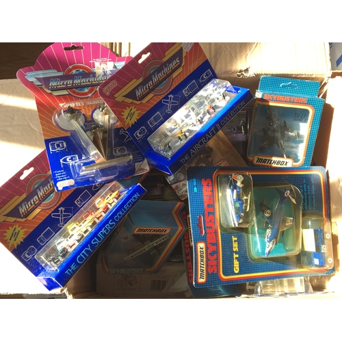 701 - A box containing Matchbox Skybusters and Micro Machines and others all boxed.