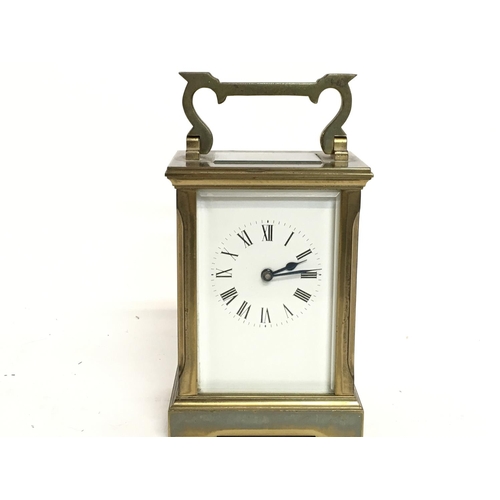 1317 - A brass carriage clock, this lot cannot be posted