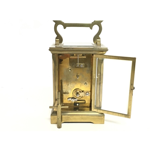 1317 - A brass carriage clock, this lot cannot be posted