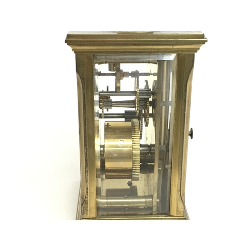 1317 - A brass carriage clock, this lot cannot be posted
