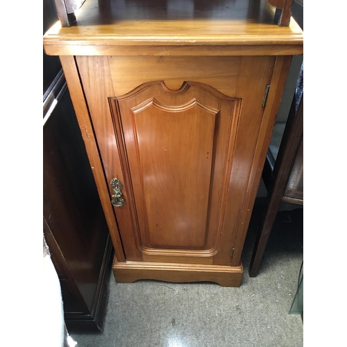 1325 - A satin walnut bedside cabinet. approx 77cmx41cm.
