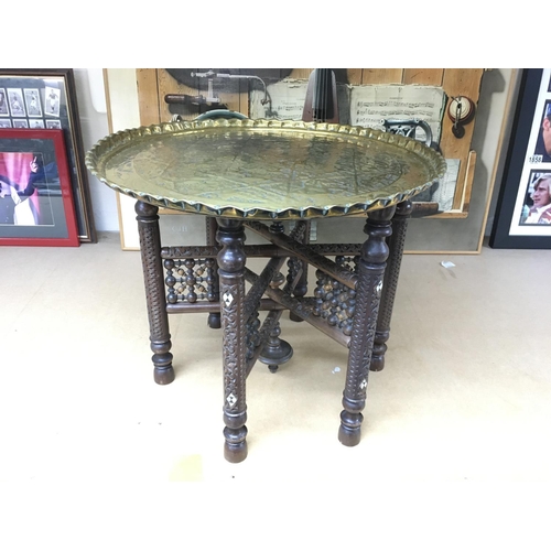 1347 - A Persian bobbin table. Approx 42cm high and 49cm wide.