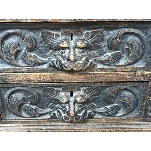 1353 - A Late Victorian oak carved desk with leather top, dimensions 75x152x126cm