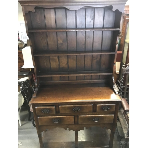 1359 - A reproduction 18th century style oak dresser , dimensions 45x106x193cm