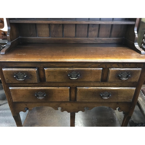 1359 - A reproduction 18th century style oak dresser , dimensions 45x106x193cm