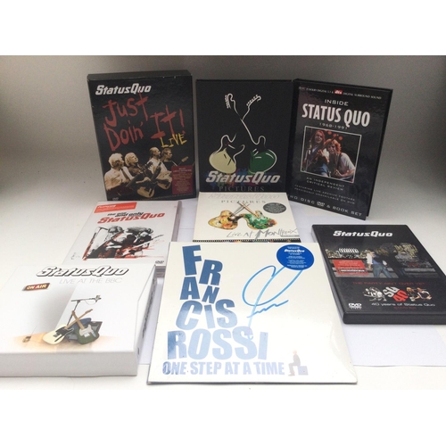 109 - A collection of Status Quo CD and DVD sets plus a signed and sealed Francis Rossi 7inch single.