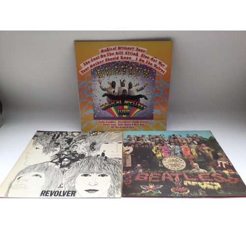 112 - Three early pressings of Beatles LPs comprising 'Sgt Pepper', 'Revolver' and 'Magical Mystery Tour' ... 