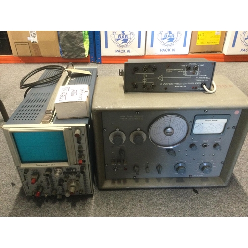 1161 - A Marconi TF9995A signal generator, a Telequipment D83 oscilloscope, a 6 way distribution amplifier ... 
