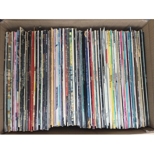 128 - A box of LPs by various artists including Ry Cooder, Rupert Holmes, Elton John, George Benson and ot... 