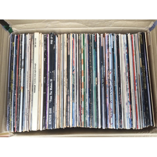 129 - A box of LPs by various artists including Eric Clapton, Judy Collins, Michael Jackson, Kate Bush and... 
