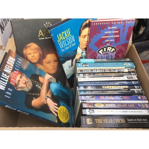 135 - A box of DVDs and CD long box sets by various artists including Abba, Jackie Wilson, Willie Nelson a... 