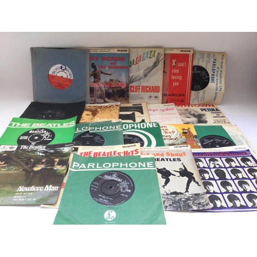 136 - A record case of 7inch singles and EPs by various artists including The Beatles, Ray Charles, Cliff ... 