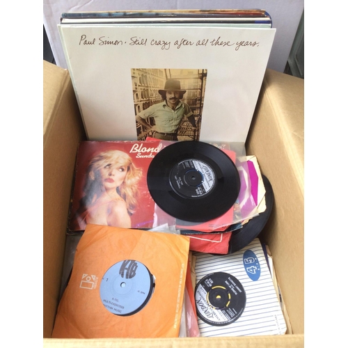 139 - A box of LPs and 7inch singles by artists from the 1960s onwards.