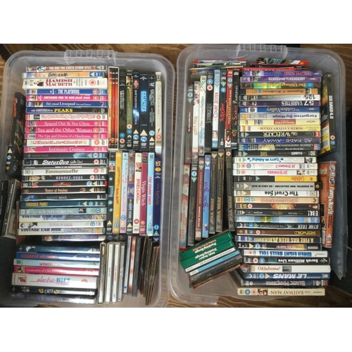 153 - Five boxes of DVDs, various films and TV series.