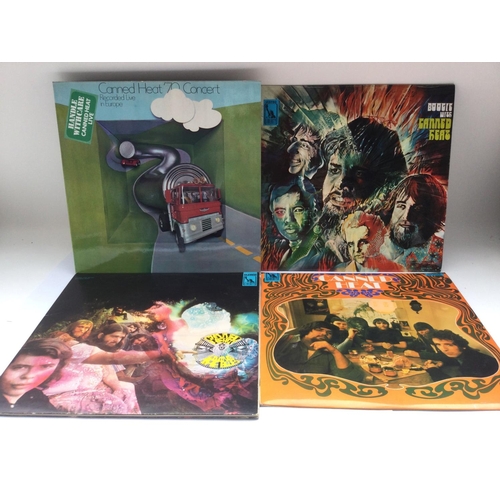 165 - Four Canned Heat LPs comprising 'Living The Blues', 'Boogie With Canned Heat', the self titled LP an... 