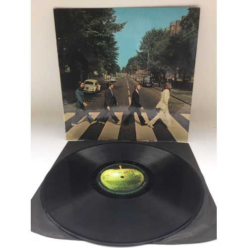 169 - A first UK pressing of The Beatles 'Abbey Road' LP, VG+/EX.