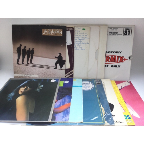 176 - A collection in two bags of mainly 1980s/90s pop and dance 12inch singles and LPs including picture ... 