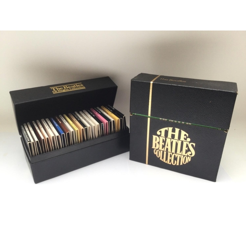 180 - Two Beatles box sets comprising a CD singles collection box set CDBSC-1 and Beatles singles collecti... 