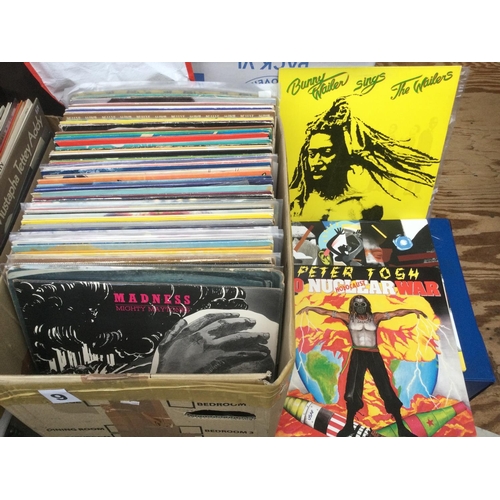 184 - A box of reggae and ska LPs and 12inch singles by various artists including an original Wailers 'Cat... 