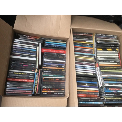 283 - Five boxes of CDs by various artists comprising The Ramones, Kasabian, Deep Purple, Slipknot, Iron M... 