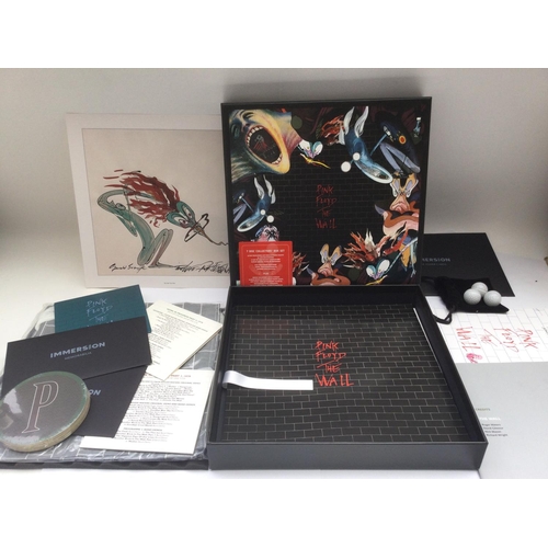 298 - A Pink Floyd 7 disc Immersion box set of 'The Wall' complete with all inserts.