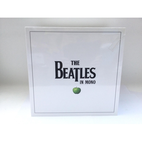 300 - The Beatles in Mono 11LP box set pressed on 180g vinyl complete with 108 page hardback book.