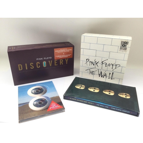 382 - A Pink Floyd 'Discovery' multi CD box set, a Record Store Day exclusive 'The Wall' 7inch singles box... 