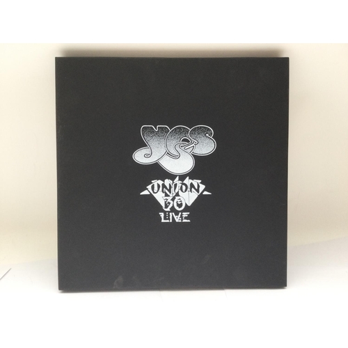 391 - A limited edition Yes 'Union 30 Live' vinyl box set complete with inserts.