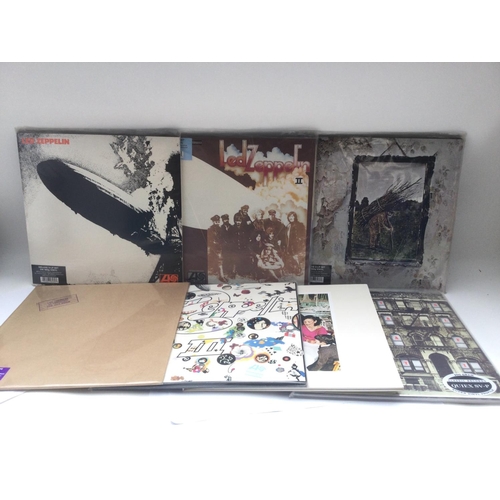 401 - Two bags containing 7 Led Zeppelin LPs remastered and produced by Jimmy Page and pressed on 180g and... 