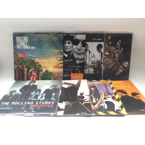 407 - Two bags containing eight Rolling Stones LPs comprising 'Sweet Summer Sun', 'Shine A Light', 'Totall... 