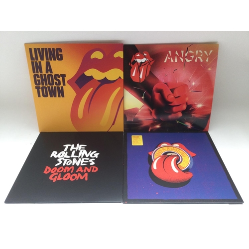 409 - Two bags containing seven Rolling Stones and related LPs comprising 'Hackney Diamonds', 'Blue & Lone... 