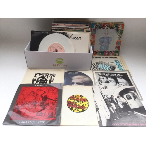 64 - A collection of 7inch singles by various artists from the 1970s and 80s including Paul McCartney, Ka... 