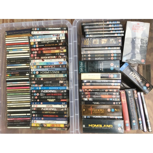 65 - Two boxes of CDs and DVDs and BluRays by various artists including Adele, Manic Street Preachers, Be... 